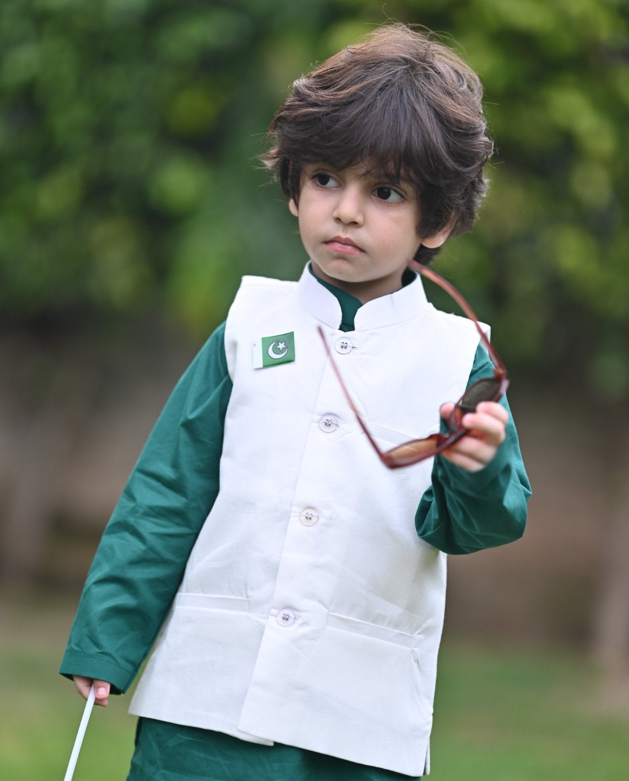 GREEN KURTA WHITE TROUSER AND WHITE WAISTCOAT