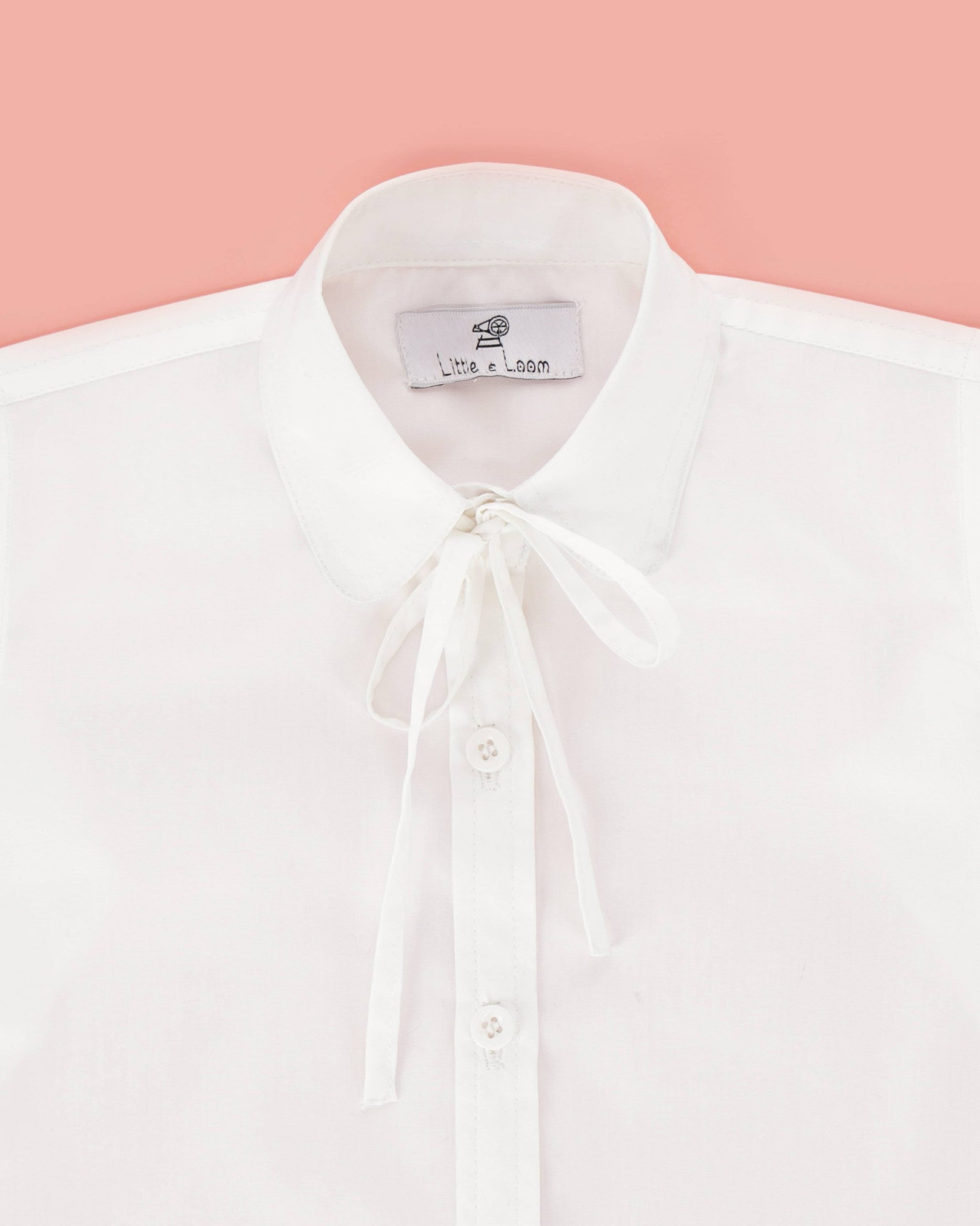 THE CLASSIC WHITE SHIRT WITH WHITE RIBBON