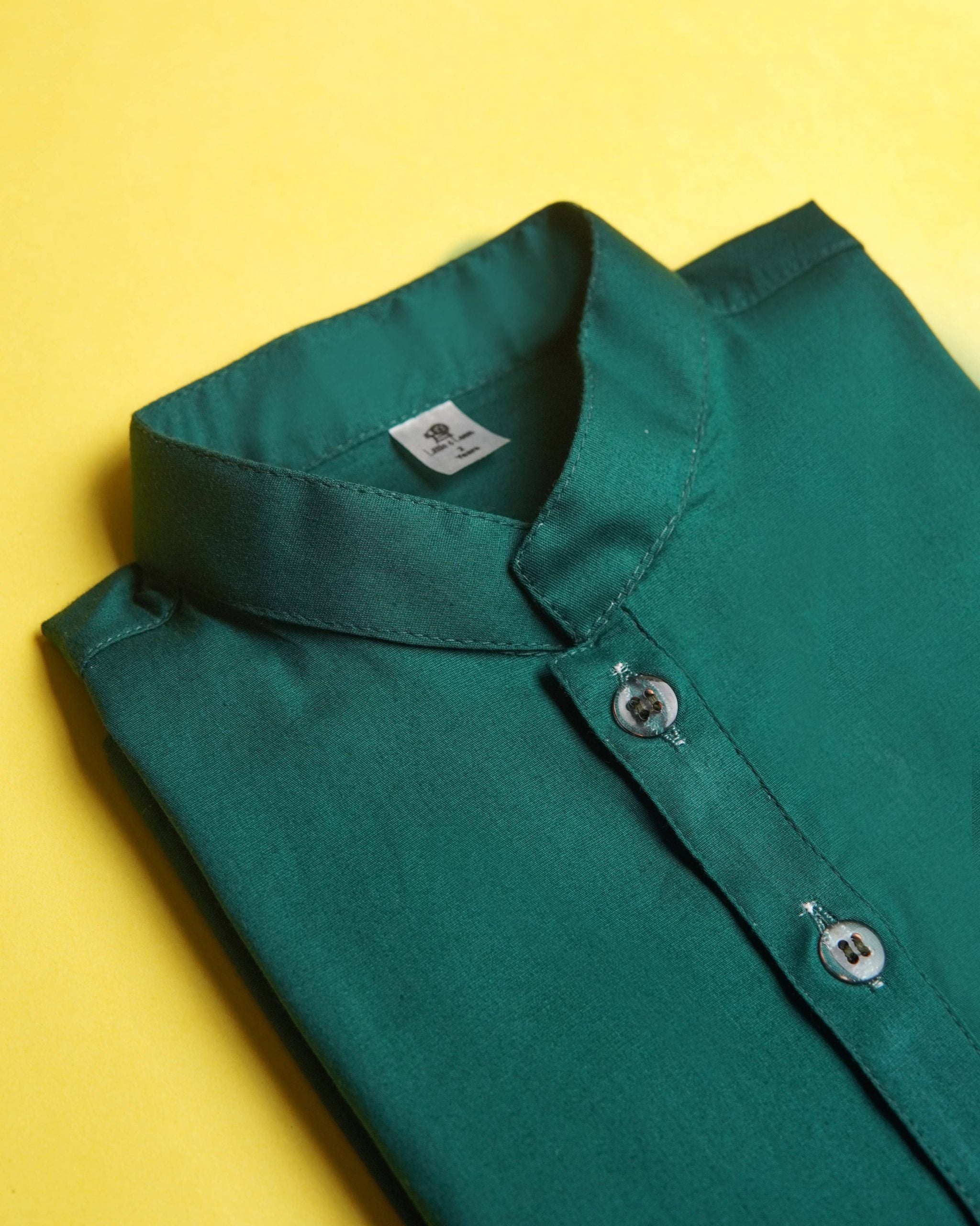 GREEN KURTA AND WHITE TROUSER