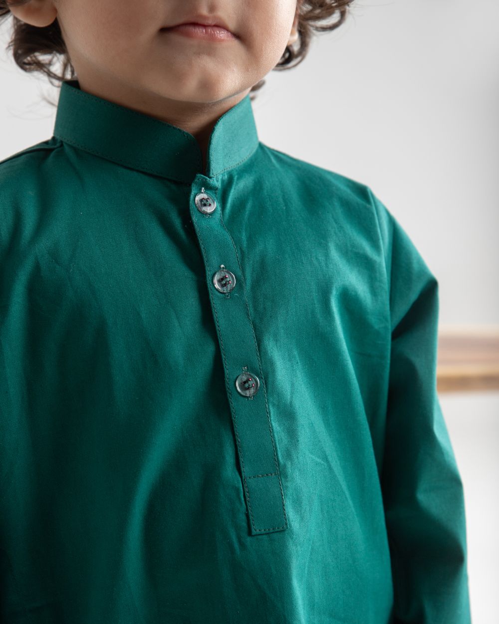 GREEN KURTA AND WHITE TROUSER